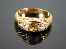 A yellow metal antique gold ring set with diamond