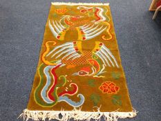A Tibetan rug with bird decor £30-50