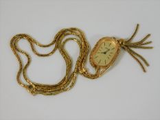 A ladies Montine gold plated watch with guard chai