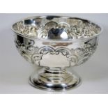 An English silver rose bowl with organic relief de