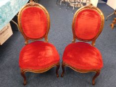 A pair of 19thC. upholstered walnut chairs