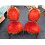 A pair of 19thC. upholstered walnut chairs