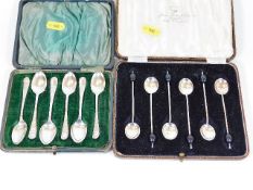 Two sets of boxed silver spoons