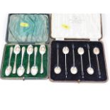 Two sets of boxed silver spoons