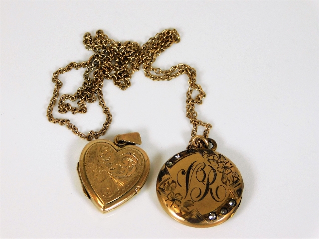 A yellow metal locket & chain with small diamonds