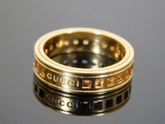 An 18ct Gucci spinner ring