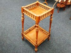 A galleried two tier pot stand