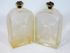 A pair of etched early 20thC. glass flasks