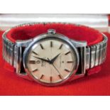 An Omega Chronometer Constellation wrist watch wit