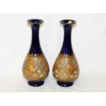 A pair of Royal Doulton stoneware vases