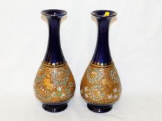 A pair of Royal Doulton stoneware vases