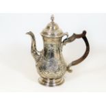 A Georgian silver coffee pot with London assay mar