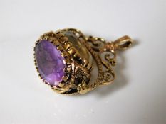 An antique 9ct gold seal with amethyst & citrine