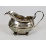 A Georgian silver cream jug