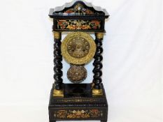 A Napoleon III French portico clock with brass inl