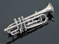A novelty silver trombone