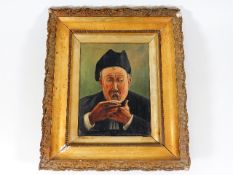 A c.1900 gilt framed oil on canvas of man eating o