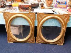 A pair of 19thC. oval gilt frame inserts