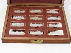 A boxed set of silver proof stately homes