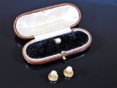 Two 18ct gold mounted pearl collar studs with one