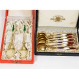 Two sets of boxed enamelled Danish silver gilt spo