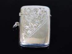 A silver vesta case with chased decor