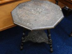 An early 20thC. carved two tier occasional table