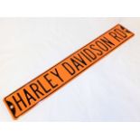 A Harley Davidson street sign