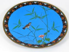 A Japanese cloisonne plate with bird design