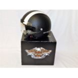A Harley Davidson helmet with box
