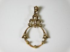 A Victorian yellow metal pendant lacking centre dr