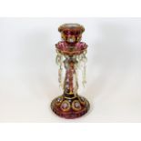 A Bohemian style glass candelabra base with lustre