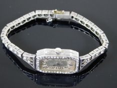 An art deco silver & paste cocktail watch