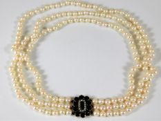 A three strand cultured pearl necklace with 19thC.