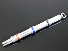 An Allen Dominy silver tri colour pencil with thre