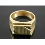 A chunky 9ct gold gents signet ring