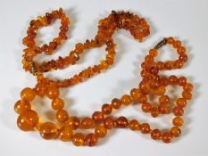 Two sets of early 20thC. amber beads