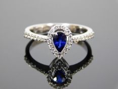 An 18ct gold sapphire & diamond ring