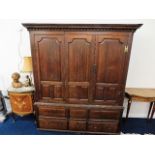 A large Georgian oak wardrobe