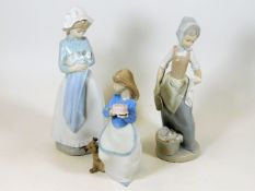 Three porcelain Nao figures