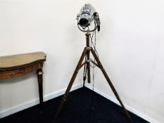 A Strand electric theatre lamp with stand