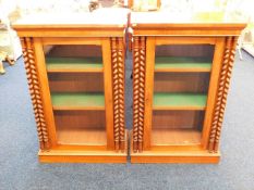 A pair of c.1900 floor standing book cases with do