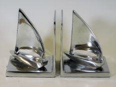 A pair of stylised bookends of yachting interest