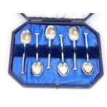 A boxed set of silver spoons