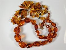 Two sets of early 20thC. amber beads