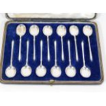 A boxed set of twelve silver teaspoons