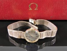 A ladies 9ct gold Omega watch & strap