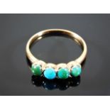 An antique yellow metal & turquoise ring