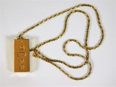 A 9ct gold pendant with chain