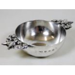 An Edinburgh 1868 silver quaich with fox decor